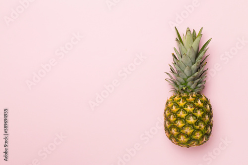 Fresh pineapple on color background  top view