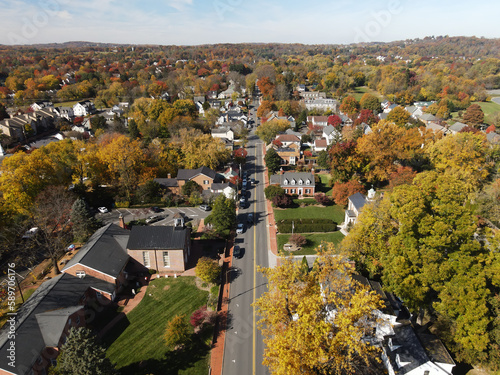 Fototapeta Naklejka Na Ścianę i Meble -  Aerial view of a cluster of houses in a small town in the state of Virginia USA shot by a drone