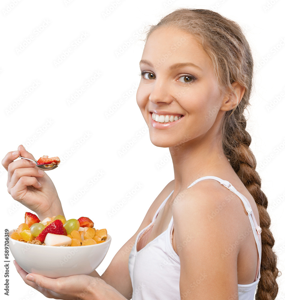 Attractive young woman holding salad and smiling at camera Attractive young woman holding salad and smiling at camera