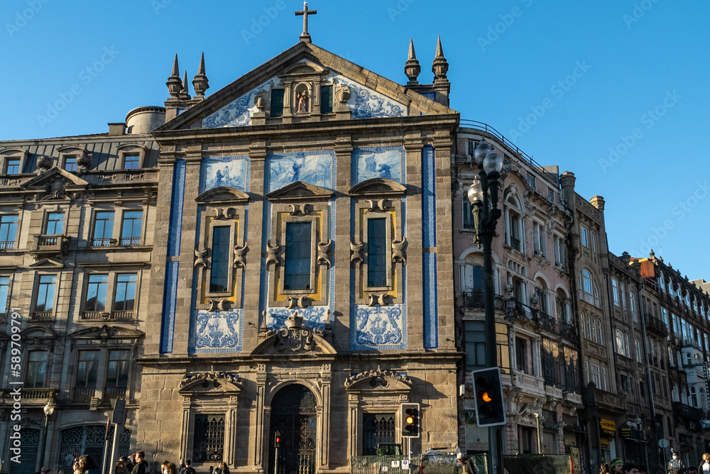 Oporto, Portugal. April 12 , 2022: Church of the azulejos congregados and blue sky.