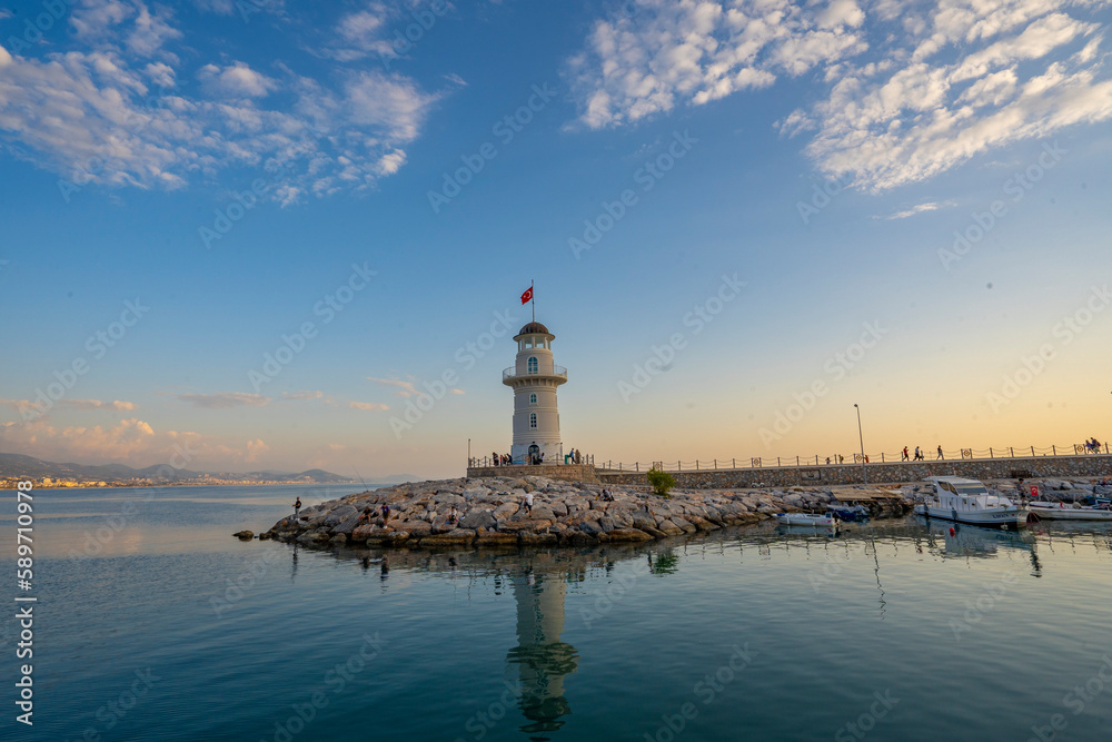 A wonderful lighthouse at sunset on the Mediterranean coast