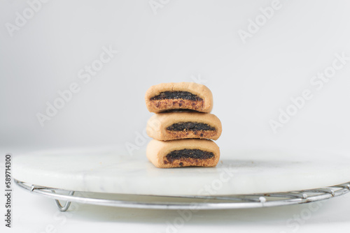 Date filled sugar cookies, homemade vanilla sugar cookies with a date filling, date bar cookies, homemade maamoul cookie bars photo