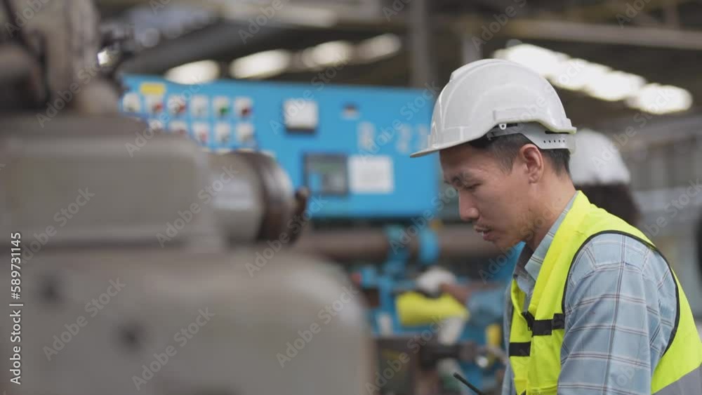 workers factory Asian man working at heavy machine. group of people ...