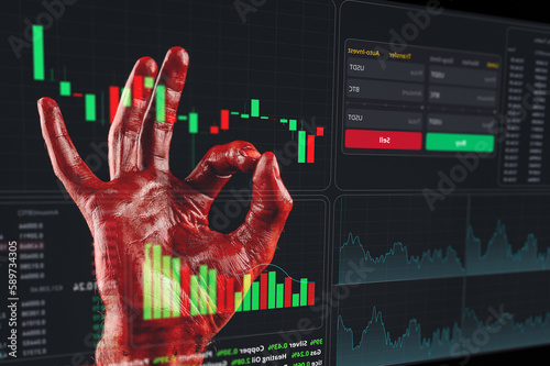 Close-up of a male hand showing an ok sign, covered in blood. financial crime. Stock charts on a virtual screen.