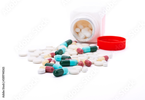 colorful pills with capsules and pills Medicine bottles isolated on white background Hospital Pharmacy Dispensing Concept Pharmacies and clinics health care