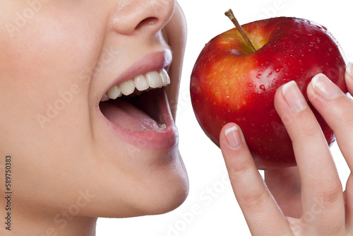 Young woman holding fresh apple on white background