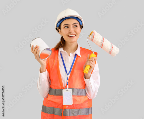Female decorator with paint...