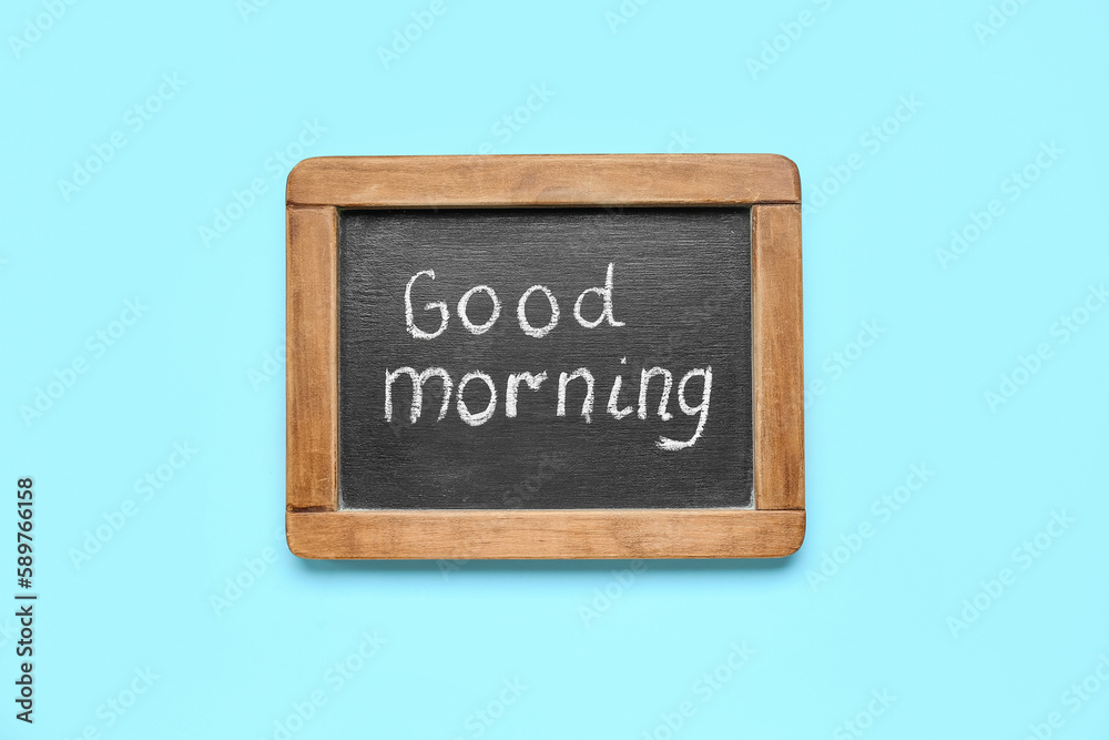 Chalkboard with text GOOD MORNING on color background