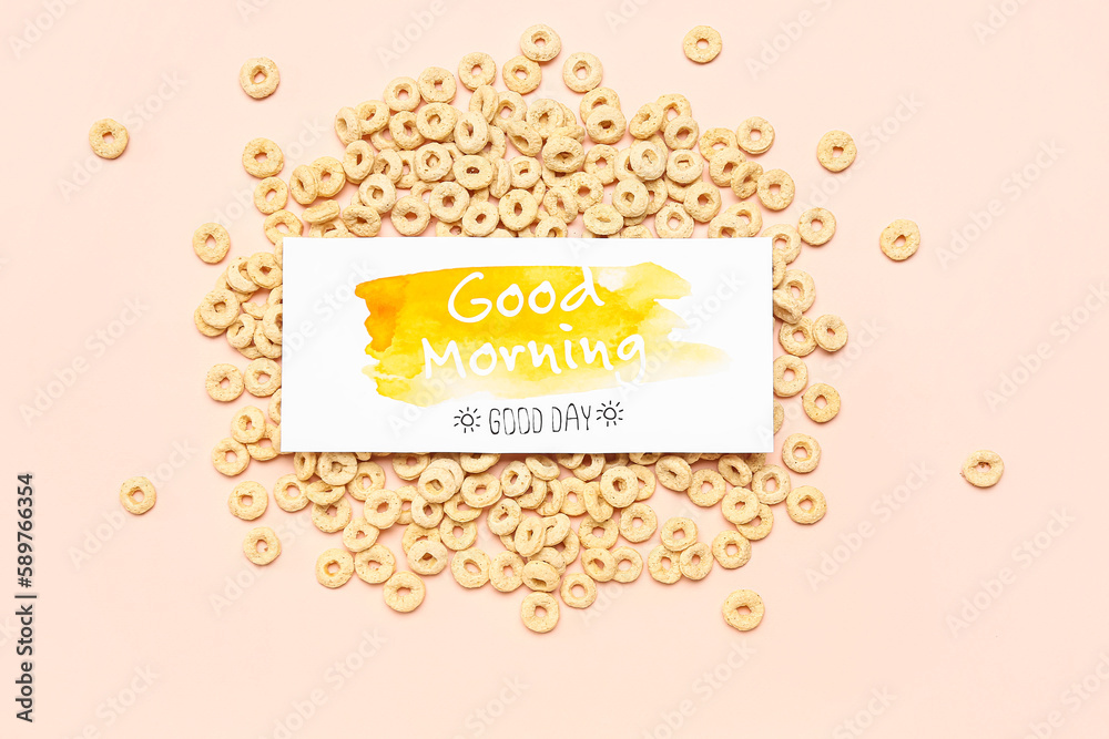 Card with text GOOD MORNING and cereal rings on color background Card with text GOOD MORNING and cereal rings on color background