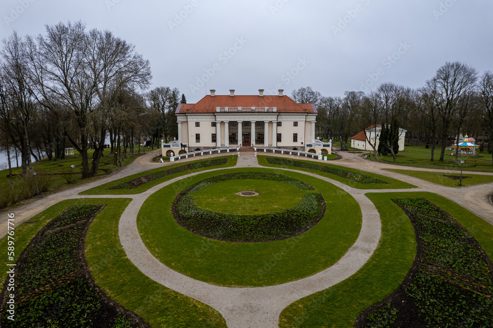 Aerial beautiful spring day view of Pakruojis manor park, Lithuania