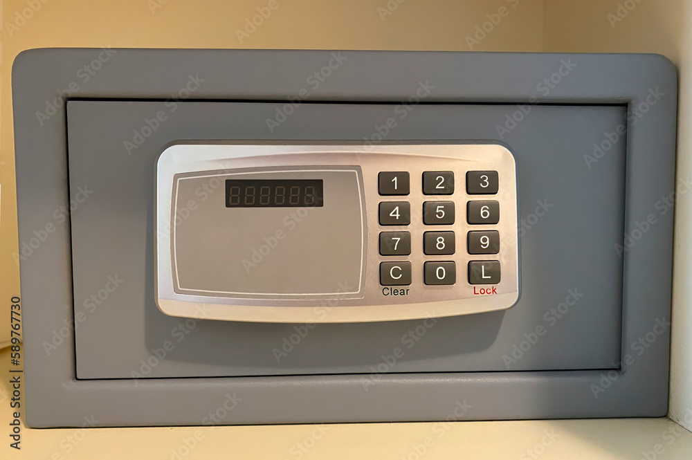 Safe hidden in the wardrobe. Home or hotel safe concept. Safe hidden in the wardrobe. Home or hotel safe concept.