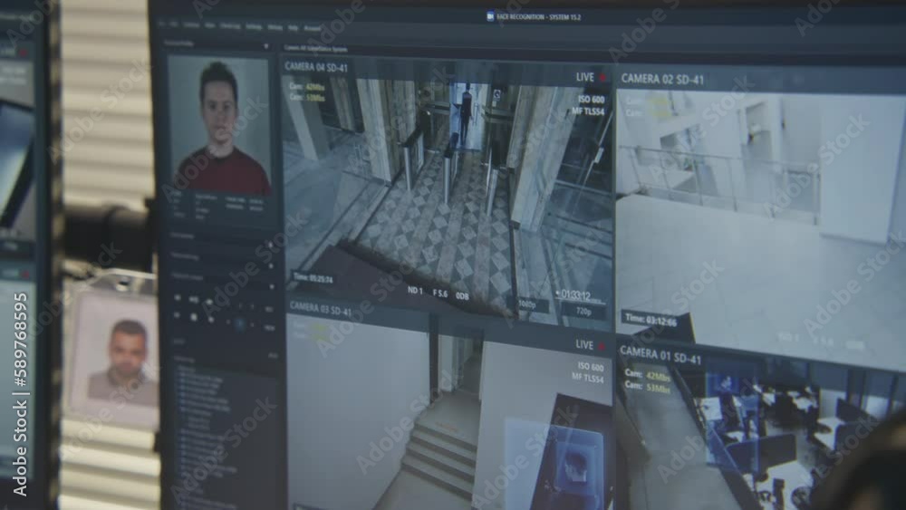 Close up shot of computer screen showing footage of surveillance cameras in coworking office with modern face recognition system. CCTV cameras. High tech security system. Concept of social safety.