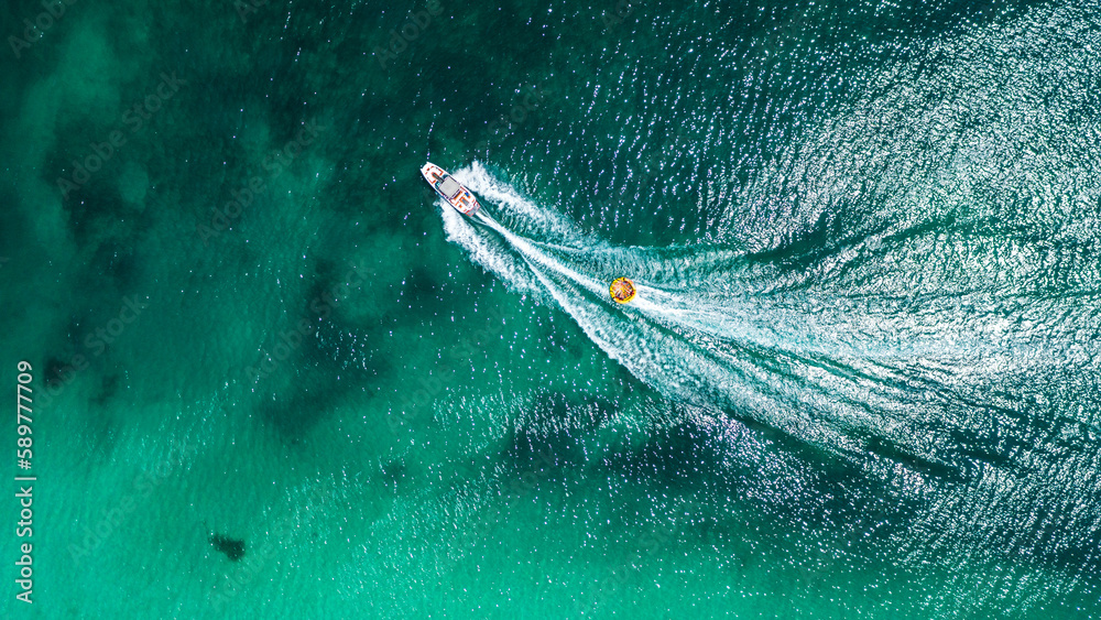 Boat in the sea, view from above.