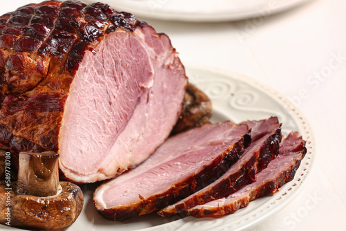 Plate with tasty smoked ham...