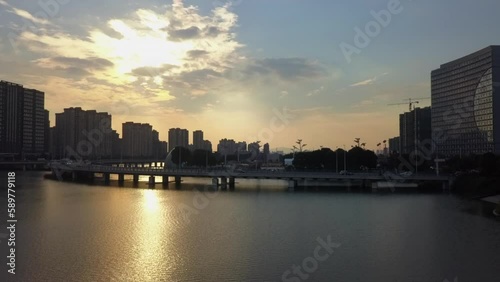 Wallpaper Mural Low afternoon aerial up river to curved bridge in Suzhou city, China Torontodigital.ca