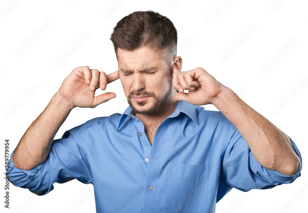 Man covers his ears with his hands on background Man covers his ears with his hands on background