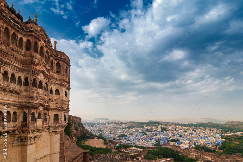 Top view of Jodhpur city as seen from famous Mehrangarh fort, Jodhpur, Rajasthan, India. Blue sky in the background. Mehrangarh Fort is UNESCO world heritage site popular amongst tourists worldwide.