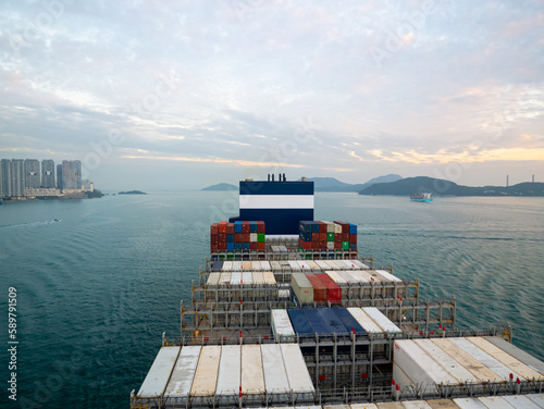 Hong Kong - 01.19.2023View form Large containership on Hong Kong Island during passage Lamma channel deliver containers to Hong Kong port.