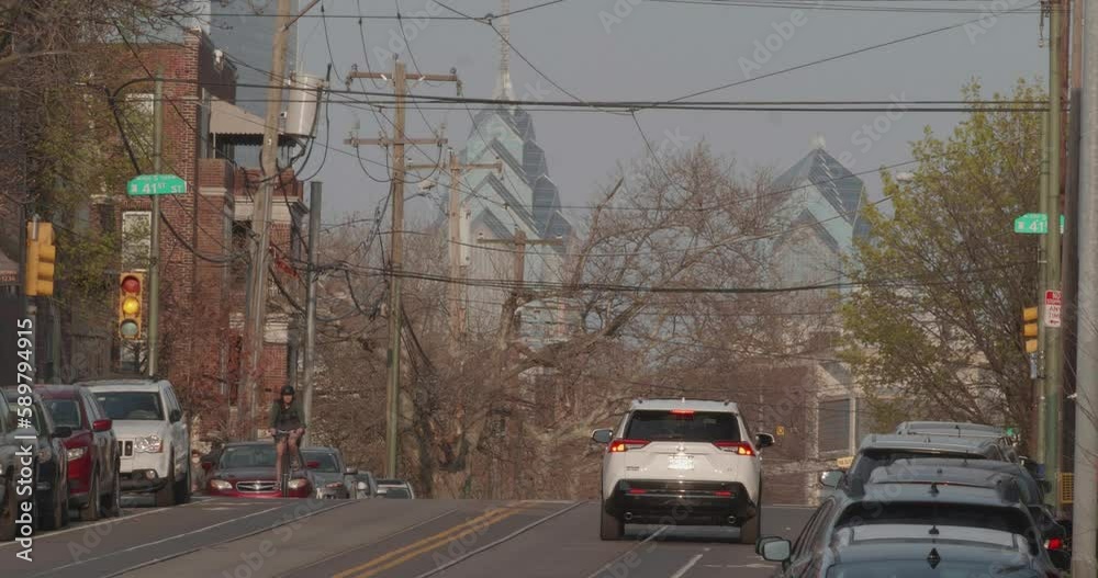 Traffic with office buildings in far distance (long lens) Traffic with office buildings in far distance (long lens)