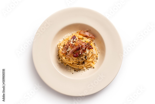 Fototapeta Naklejka Na Ścianę i Meble -  Piatto di deliziosi spaghetti alla carbonara, ripresa dall'alto - cibo italiano 