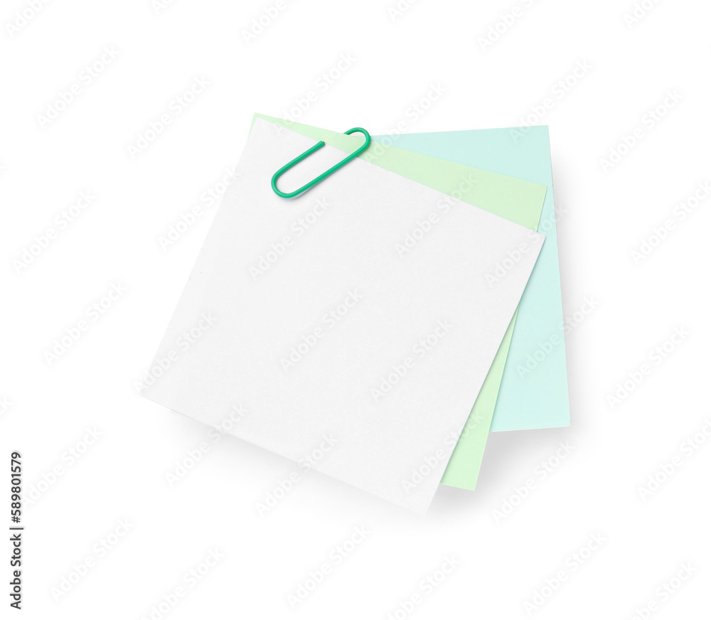 Sticky notes with paper clip on white background Sticky notes with paper clip on white background