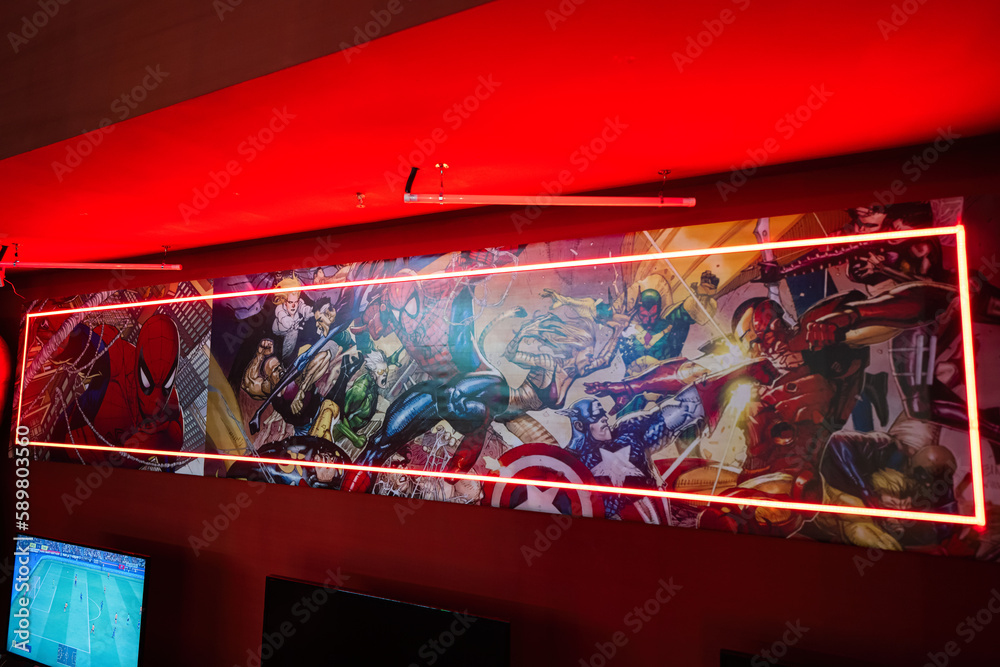 Obraz premium Ternopil, Ukraine- March, 2023: Marvel super heroes poster in red play room.