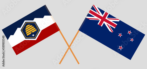 Crossed flags of New Zealand and The State of Utah. Official colors. Correct proportion photo