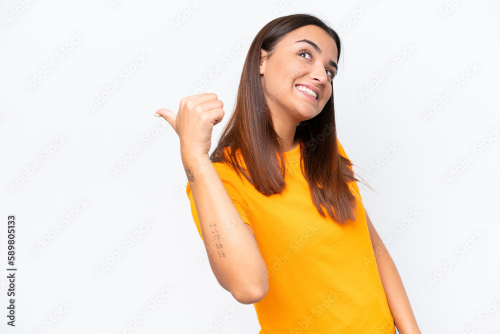 Young caucasian woman isolated on white background pointing to the side to present a product Young caucasian woman isolated on white background pointing to the side to present a product