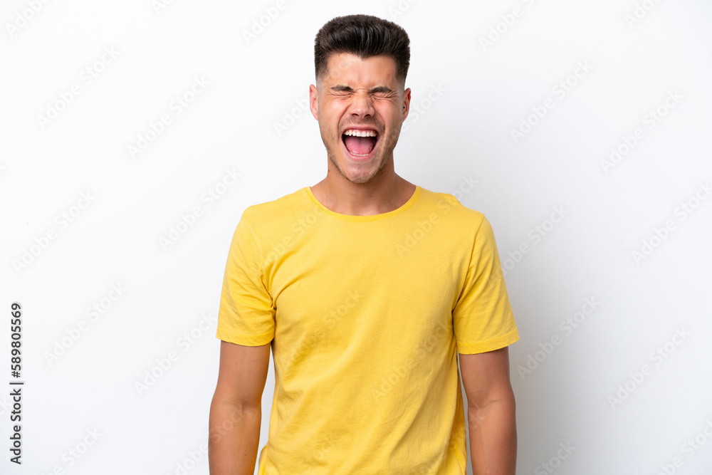 Young caucasian man isolated on white background shouting to the front with mouth wide open Young caucasian man isolated on white background shouting to the front with mouth wide open