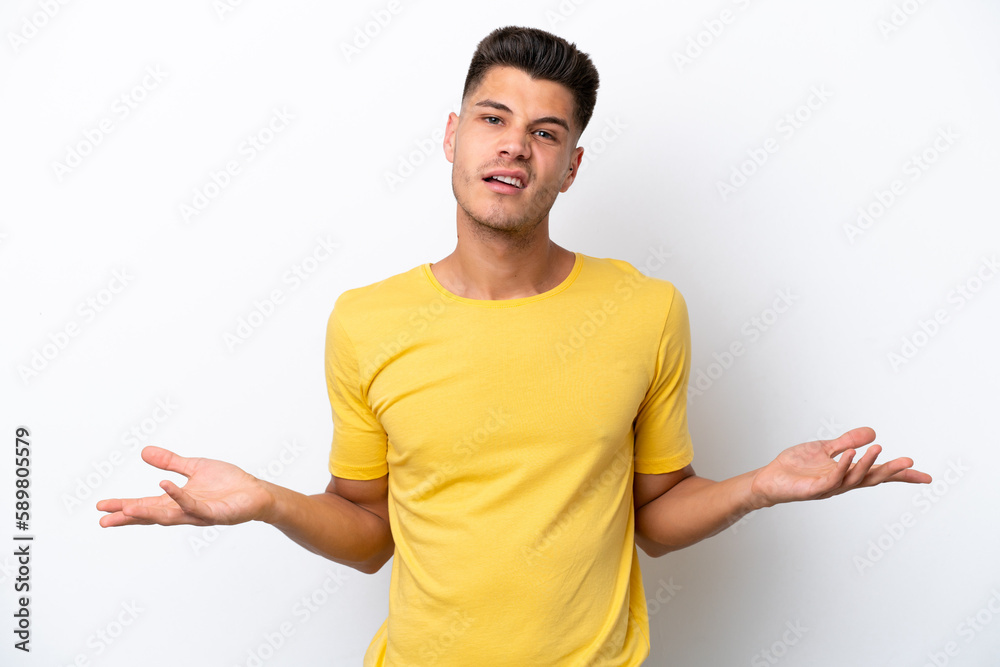 Young caucasian man isolated on white background having doubts Young caucasian man isolated on white background having doubts