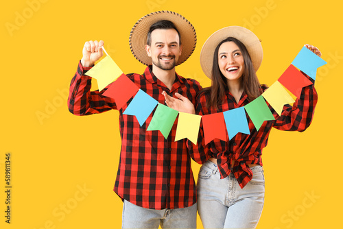 Young couple with flags on ...