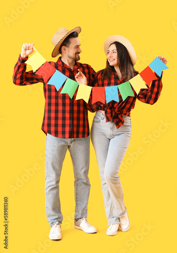 Young couple with flags on ...