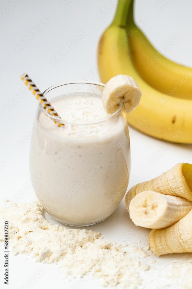 Milkshake with bananas in white background Milkshake with bananas in white background