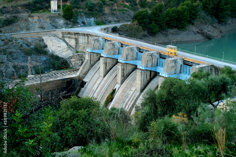 dam on Turon river, Reservoir Condo del Guadalore, hydroelectric power plant, source using energy water stream, mountain resort El Chorro gorge, mountains andalusia, concept ecology, clean energy