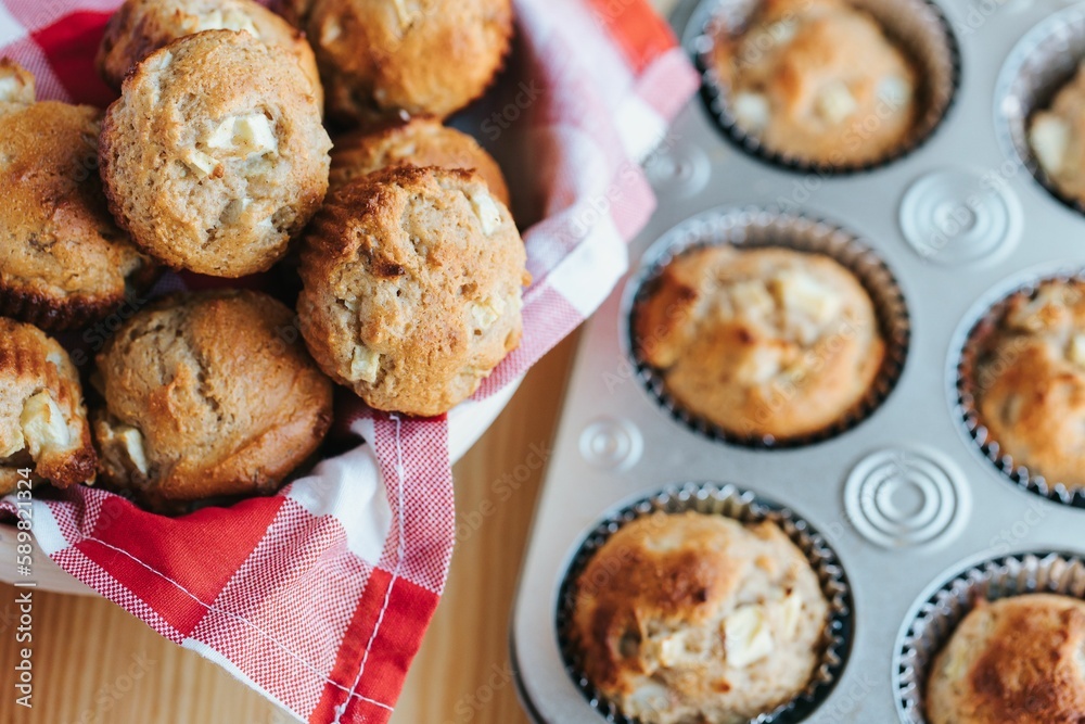Closeup shot of small muffins on the wooden background