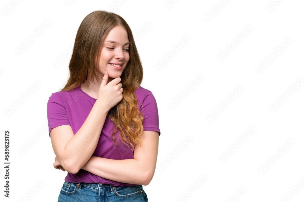 Young pretty woman over isolated background looking to the side and smiling Young pretty woman over isolated background looking to the side and smiling