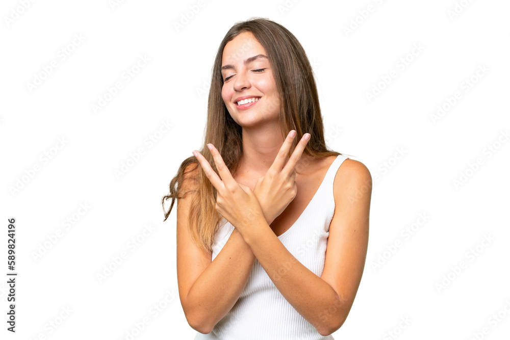 Young pretty woman over isolated background smiling and showing victory sign Young pretty woman over isolated background smiling and showing victory sign