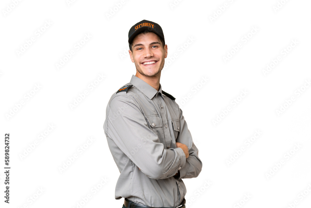 Young security man over isolated background with arms crossed and looking forward Young security man over isolated background with arms crossed and looking forward