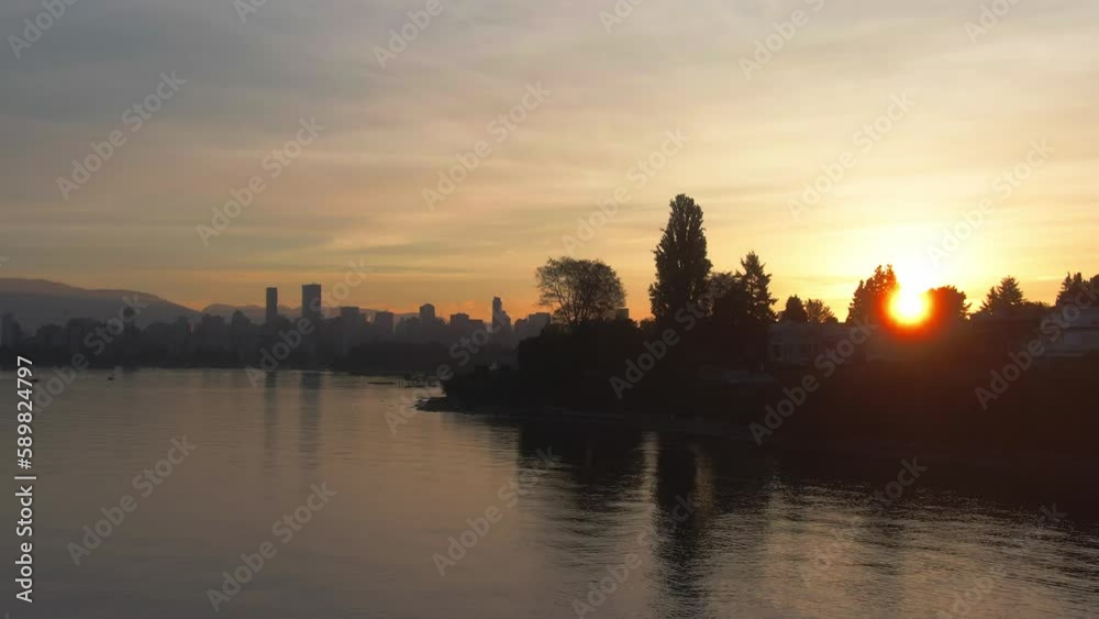 Scenic view of English Bay in Vancouver, Canada at sunrise Scenic view of English Bay in Vancouver, Canada at sunrise