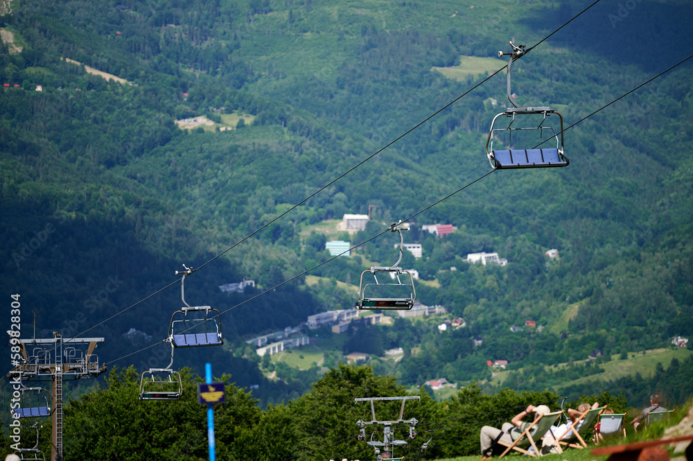 bottom view of the cable car carriages and the sky in the Polish mountains