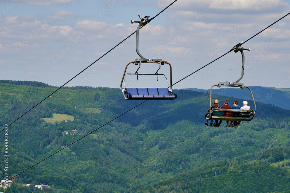 bottom view of the cable car carriages and the sky in the Polish mountains bottom view of the cable car carriages and the sky in the Polish mountains