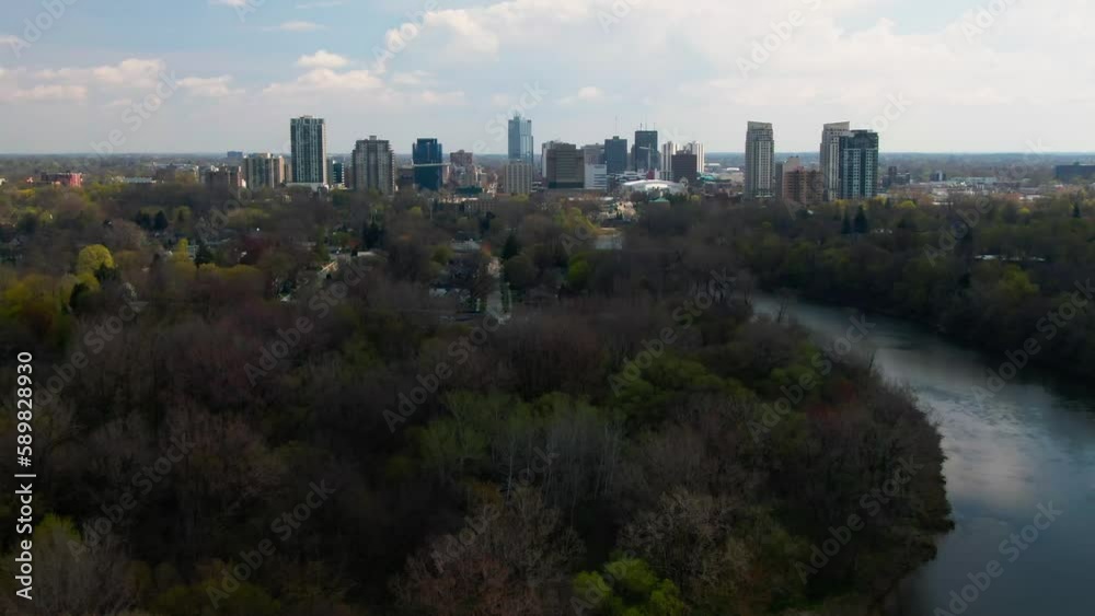 Aerial view of river surrounded by trees in city Ontario Aerial view of river surrounded by trees in city Ontario