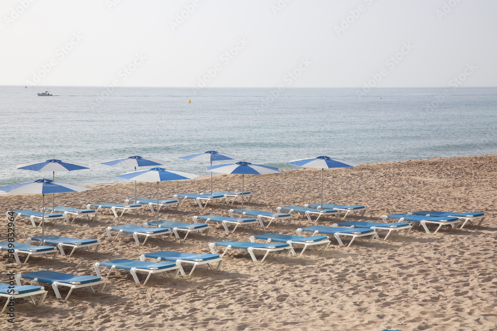 Sun Loungers on Beach, Villajoyosa, Alicante; Spain