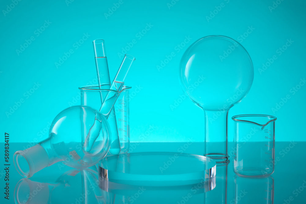 Some laboratory glassware are decorated around of a transparent podium in circle shape. Product promotion with empty area on the podium Some laboratory glassware are decorated around of a transparent podium in circle shape. Product promotion with empty area on the podium