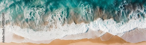 blue ocean waves on a sandy beach