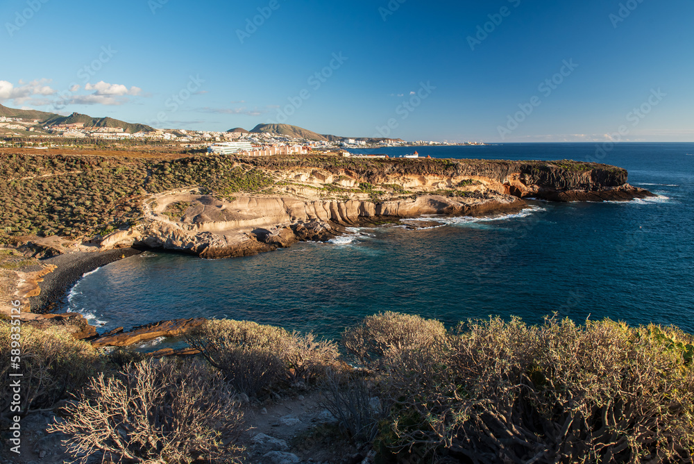 February evening on the south coast of Tenerife near Los Cristianos. View of the bay and beach.