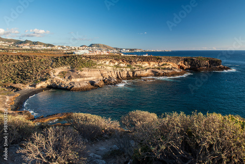 February evening on the south coast of Tenerife near Los Cristianos. View of the bay and beach.
