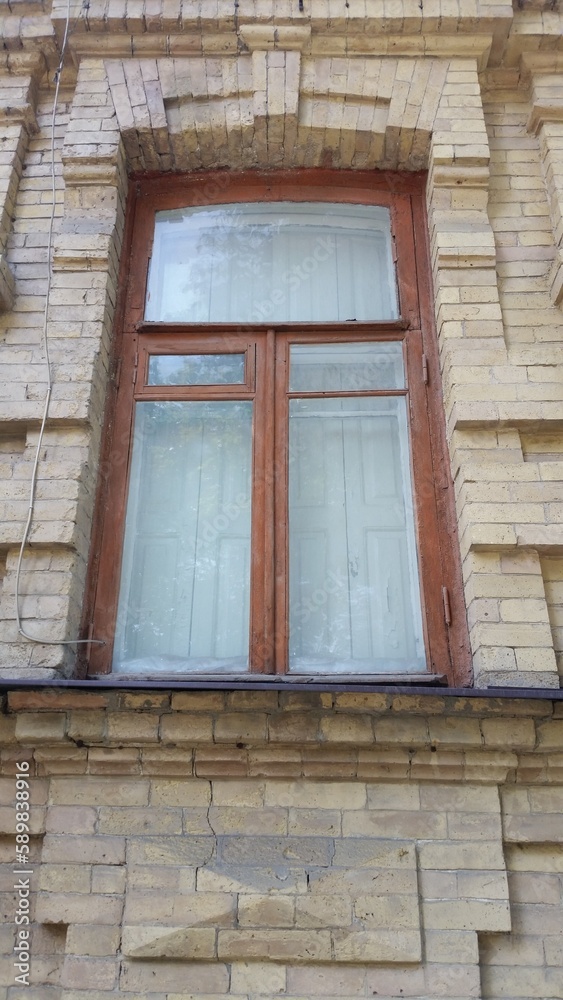 Old window with wooden frame in Pyatigorsk (Stavropol Krai, Russia) Old window with wooden frame in Pyatigorsk (Stavropol Krai, Russia)
