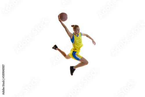 Winning goal. Young concentrated girl, female basketball player in motion, training, playing against white studio background. Isometric view. Concept of professional sport, healthy lifestyle, action