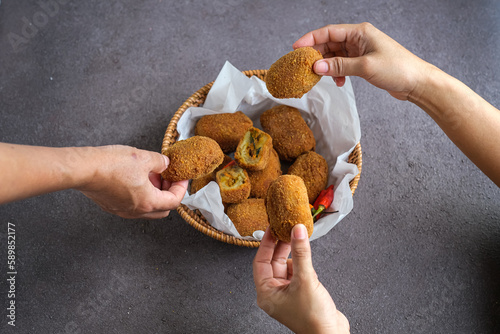 croquette or kroket is a fastfood worlwide, served as a side dish photo